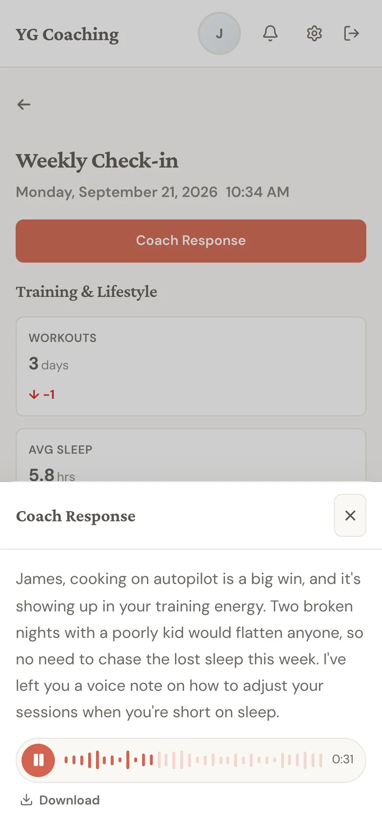 A client's phone showing the coach's written reply with a voice note player below it